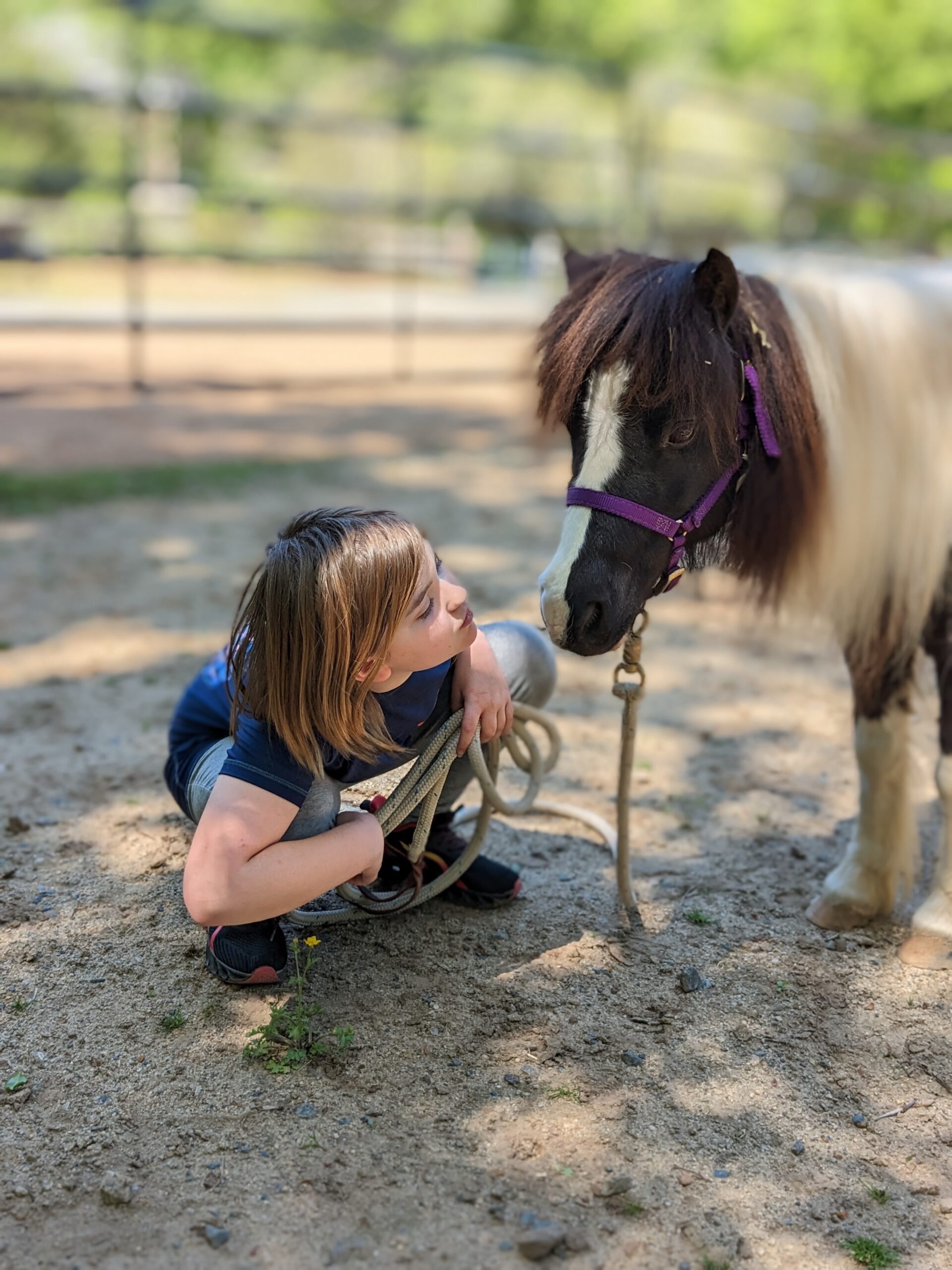 Growing Strides client getting to know Petunia.